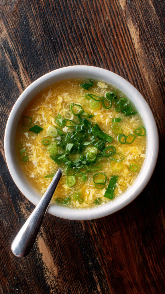Egg drop soup in a bowl.